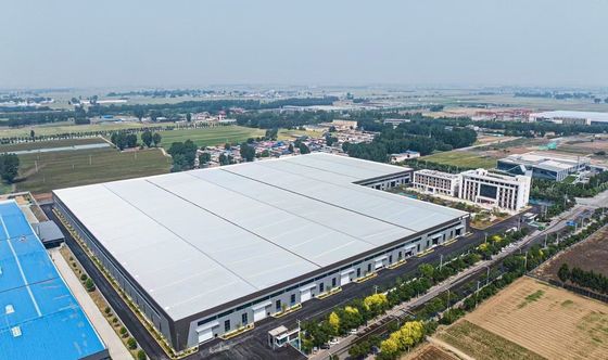 โกดังโครงสร้างเหล็กออกแบบเฟรมแข็งสำหรับอุตสาหกรรม พร้อมโซลูชั่นที่เป็นมิตรต่อสิ่งแวดล้อมและการก่อสร้าง