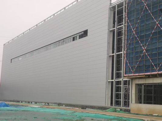 โครงสร้างสแตนเลส Prefab ความเบา โซลูชั่นการก่อสร้างคลังสินค้าที่มีมิติที่กําหนดเอง